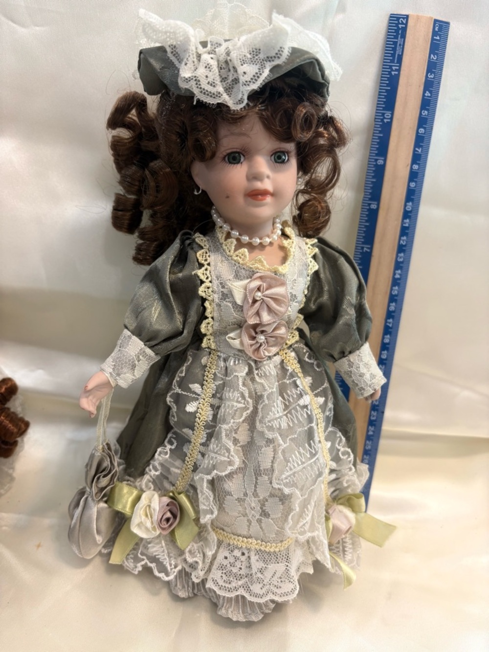 Porcelain-Style Fashion Doll in Olive Green and White Lace